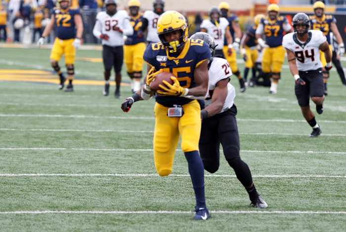 West Virginia wide receiver George Campbell hauls in a 34-yard touchdown pass from Jarrett Doege